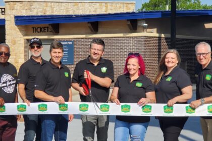 Photo of Garland City Council Members at the ribbon cutting for the Holford Aquatic Center during Build Garland Day