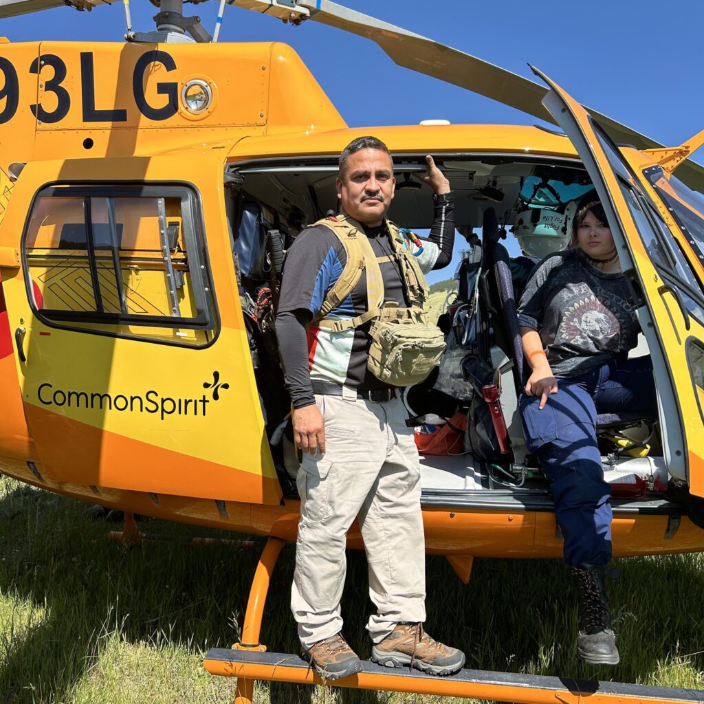 Photo of tracker, Alfonso Solis in a helicopter